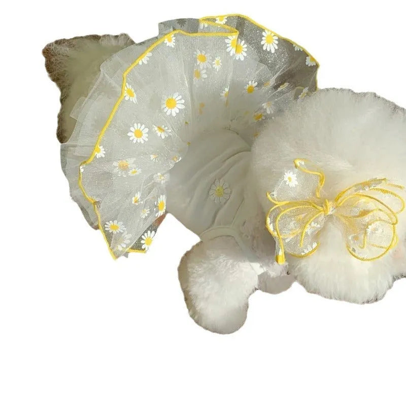 Yellow daisy print polyester dog clothing shown in sizes XS to XL for summer wear