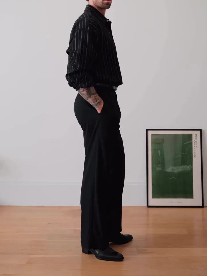 Black pinstriped button-down shirt on hanger showing regular fit and classic striped pattern