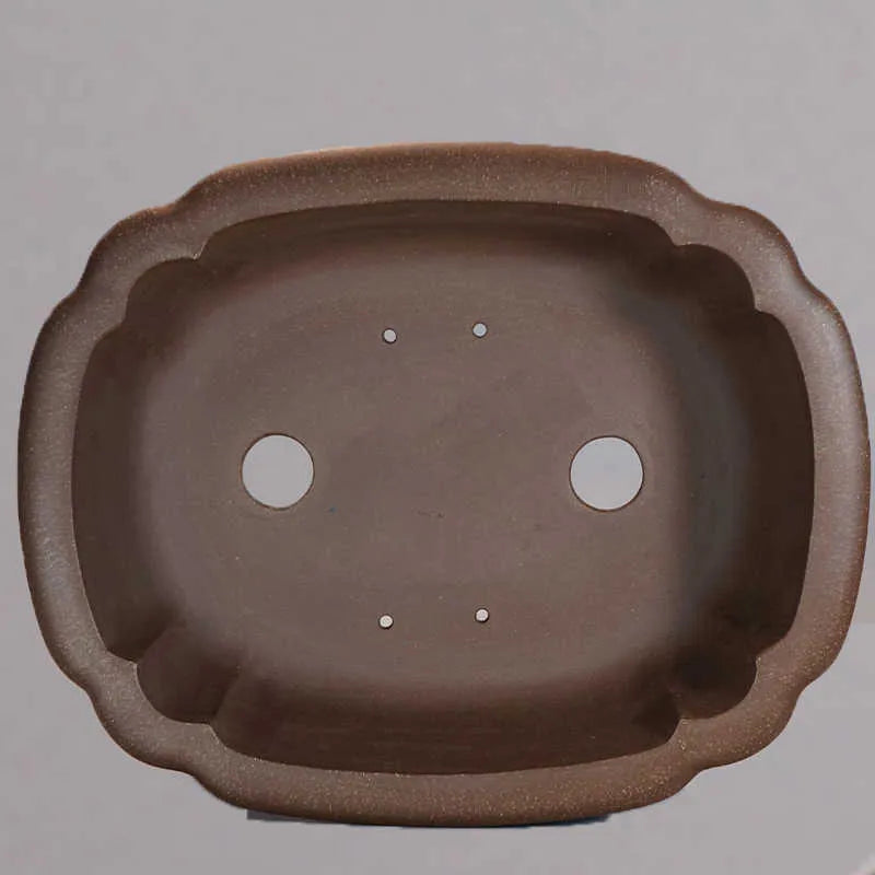 Purple sand handmade rectangular antique flower pot on desktop