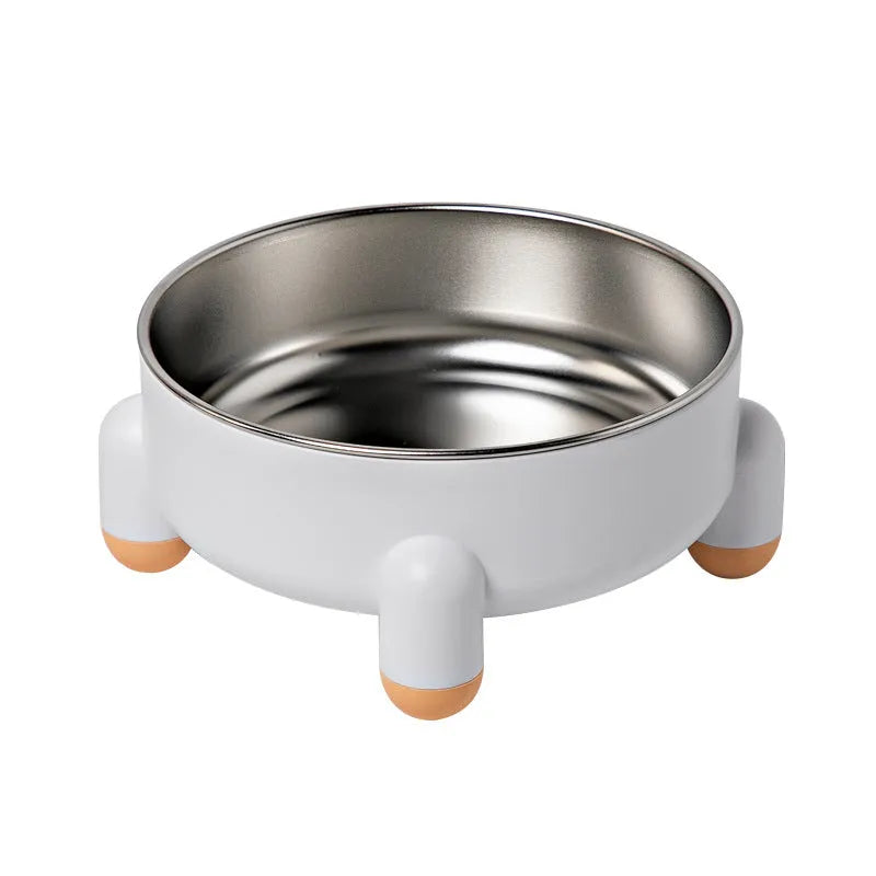 Green stainless steel pet bowl with non-slip base and high foot on a kitchen floor