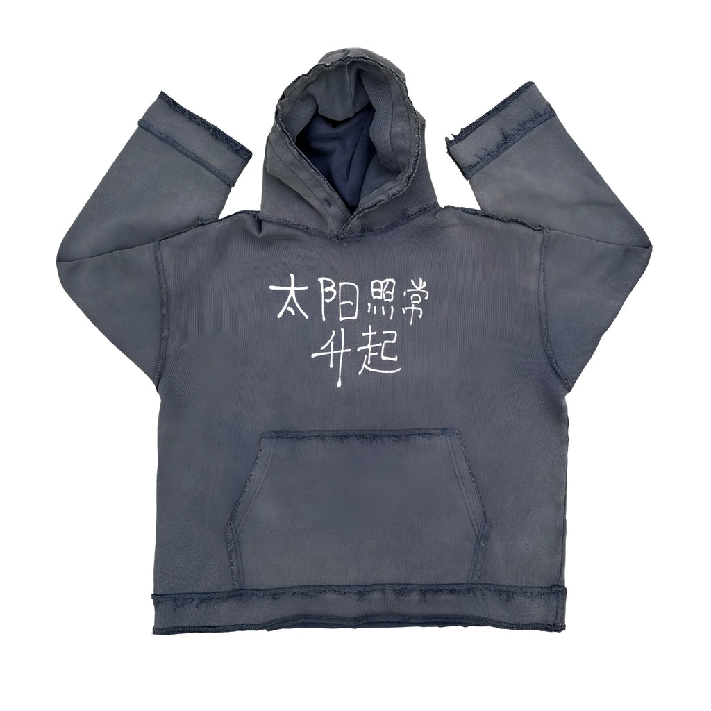 Dark blue hoodie with The Sun Also Rises graphic print on back, showing long sleeves and hood.