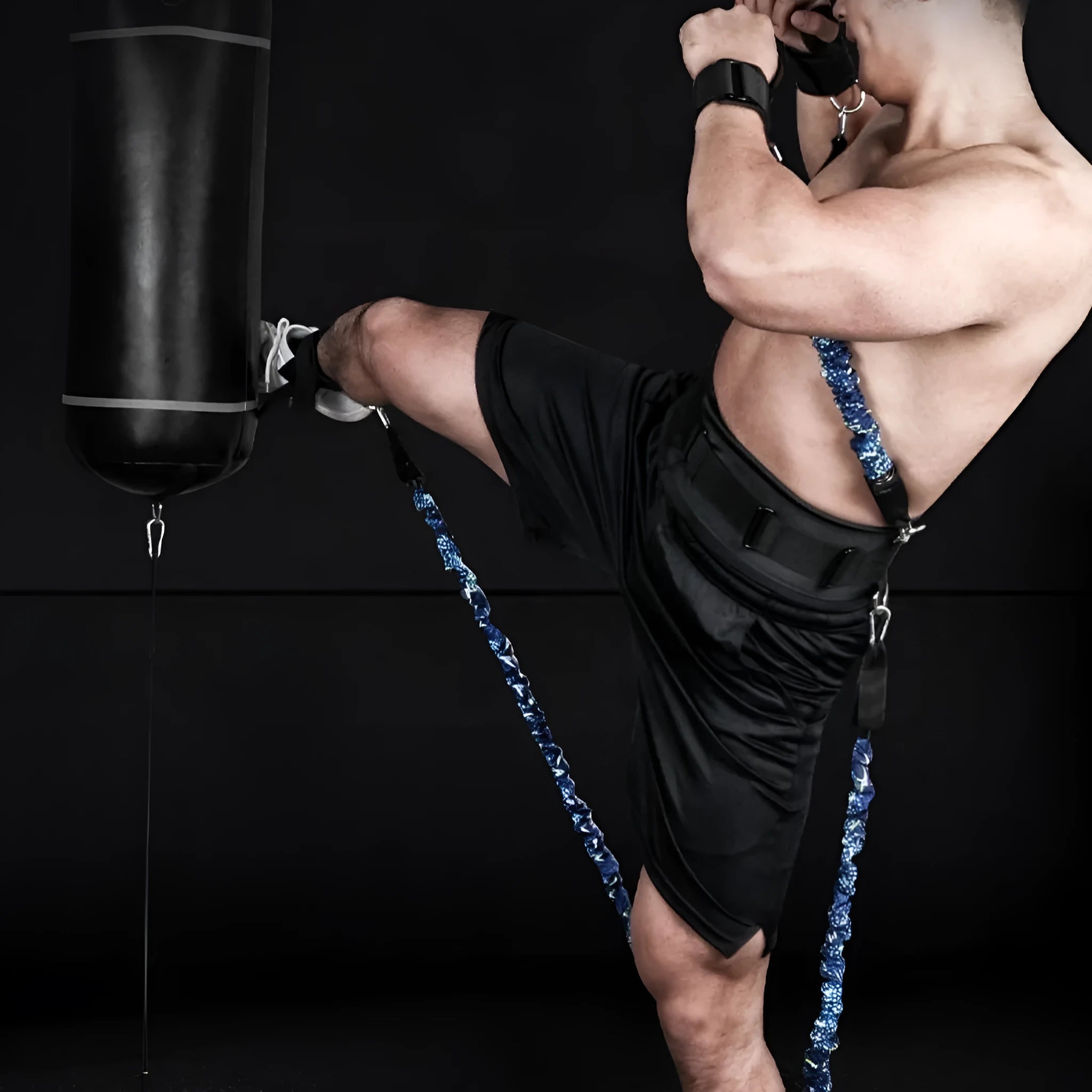 Fitness elastic training belt with TPE tube in red, blue, black, and green sleeves indicating different resistance levels.