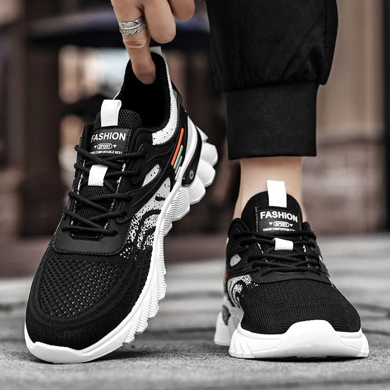 Men's white blue and black platform casual sports shoes with cross straps and mesh upper.
