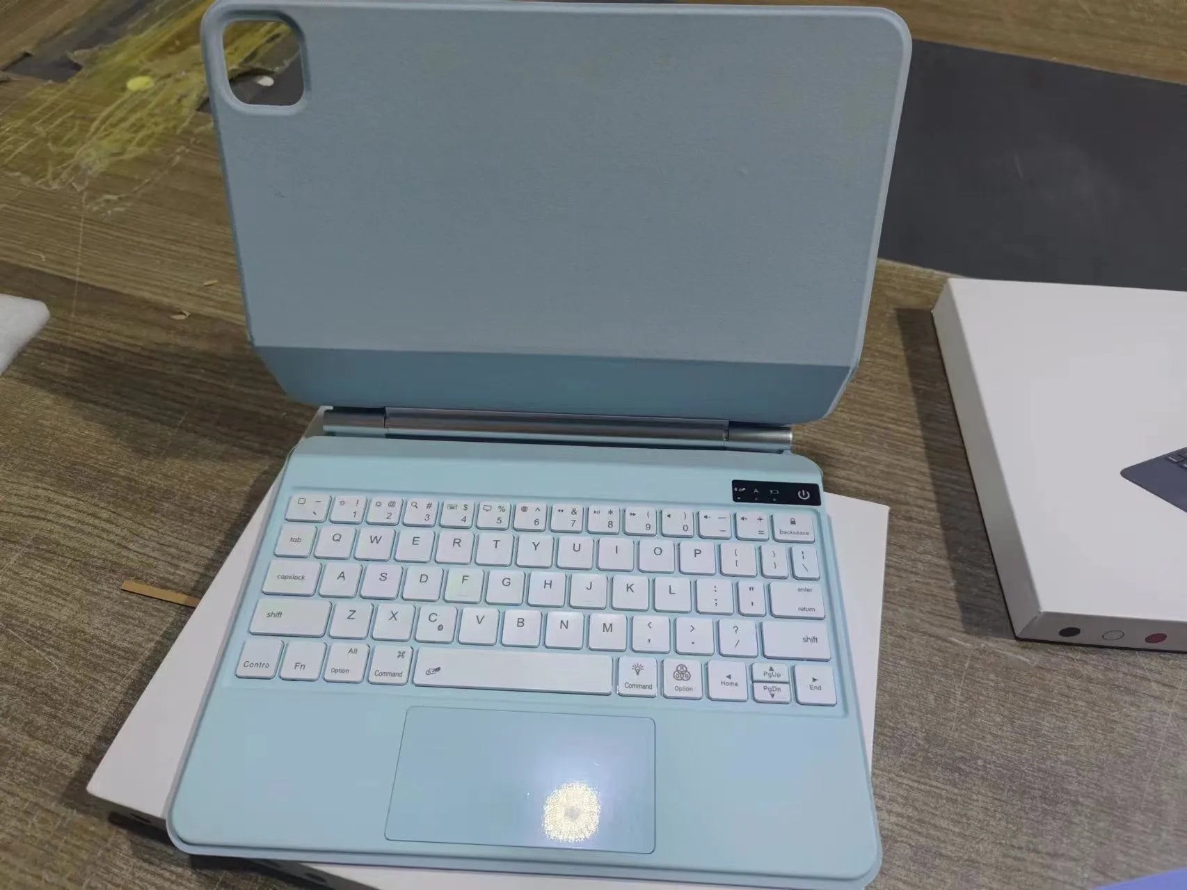 Suspension Magic Bluetooth keyboard with magnetic iPad attachment in black white pink purple or blue