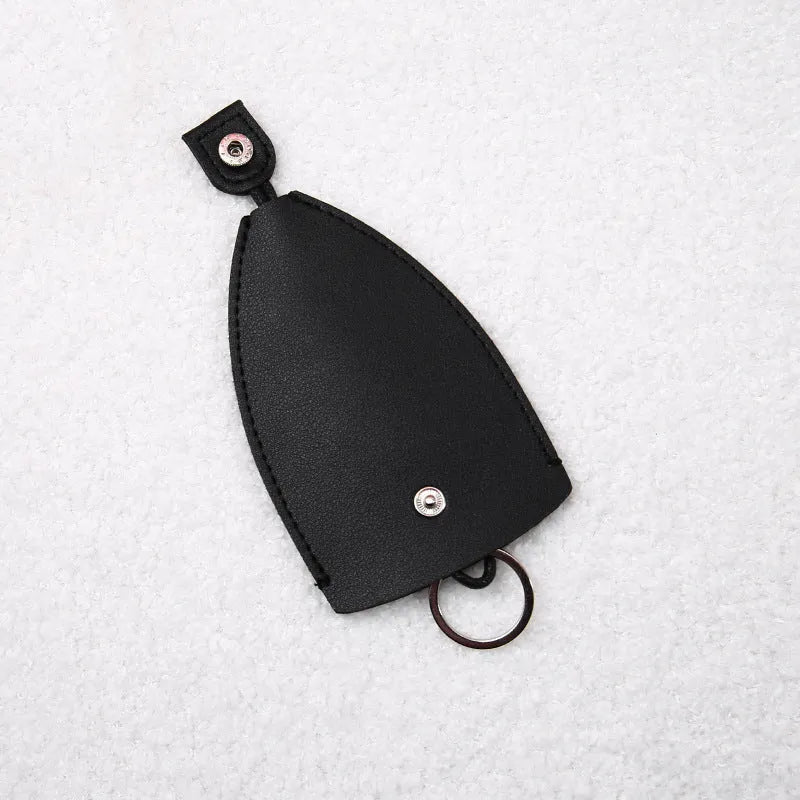 Cartoon pull-out key case in PU leather with colourful design, showing compact 14cm by 7.5cm dimensions