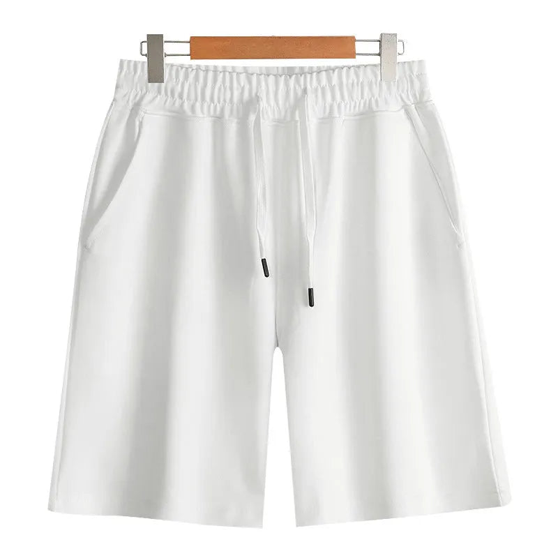 Straight leg cotton sports shorts in light grey on a neutral background.