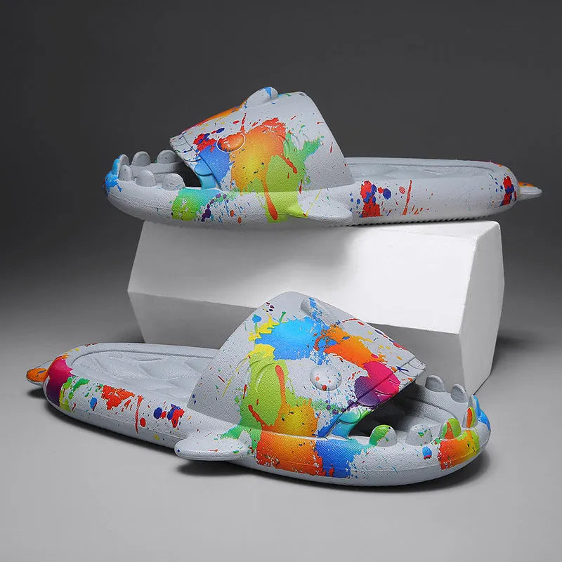 Open-toe EVA foam home slippers with shark design in beige, black, grey, and white colours.
