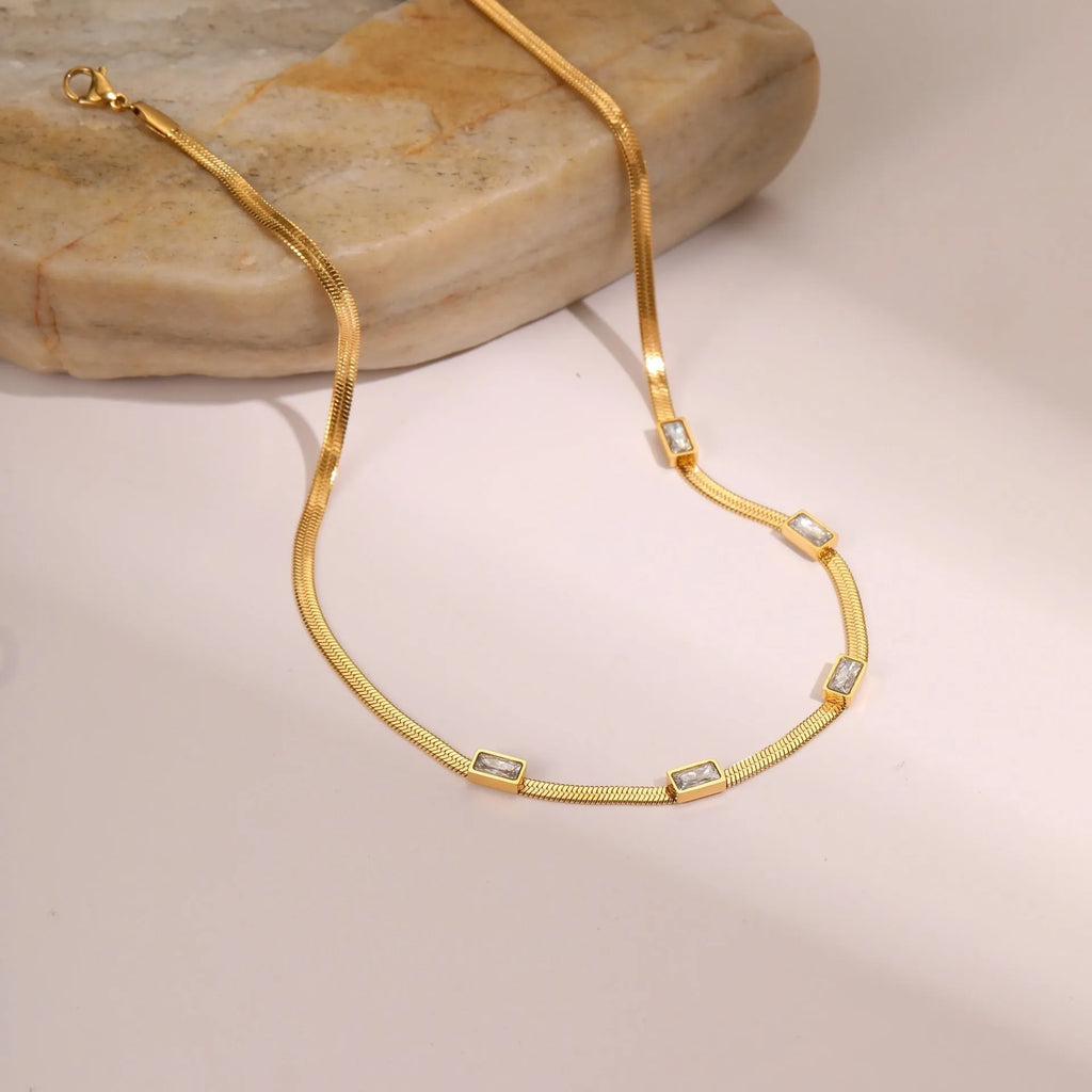 Retro geometric square zircon necklace in stainless steel with gold electroplating and flat snake-like chain links