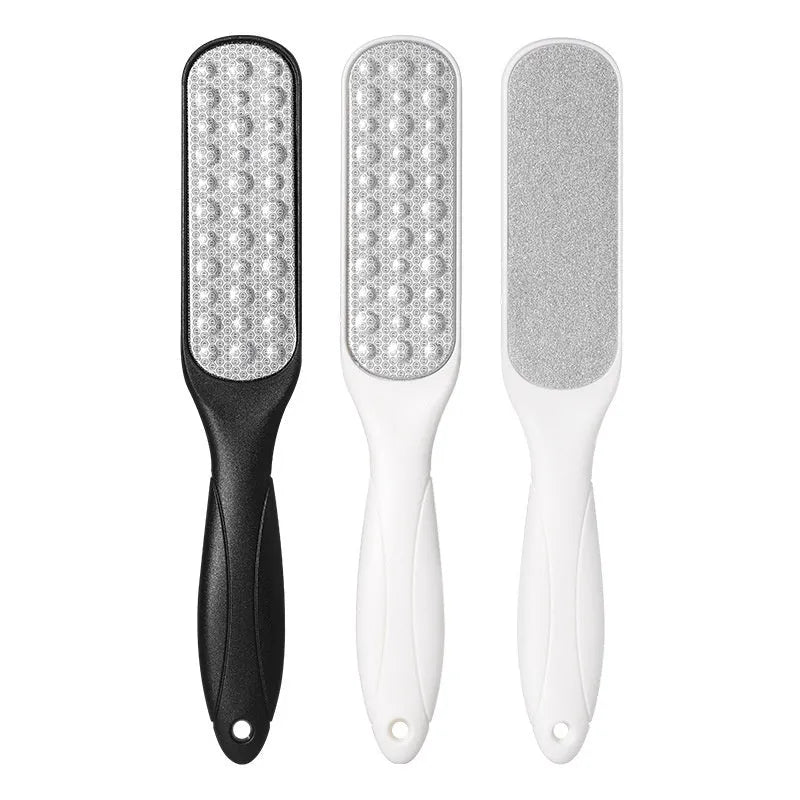 Double-sided stainless steel foot grinder tool for callus removal in black or white.