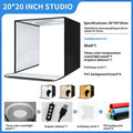 Foldable 50cm studio photo light box with integrated three-colour LED panel and reflective cloth interior.