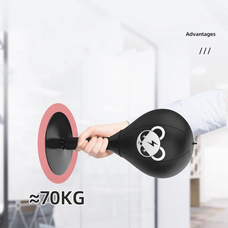 Tabletop boxing speed ball with suction cup base and PU leather ball on a desk