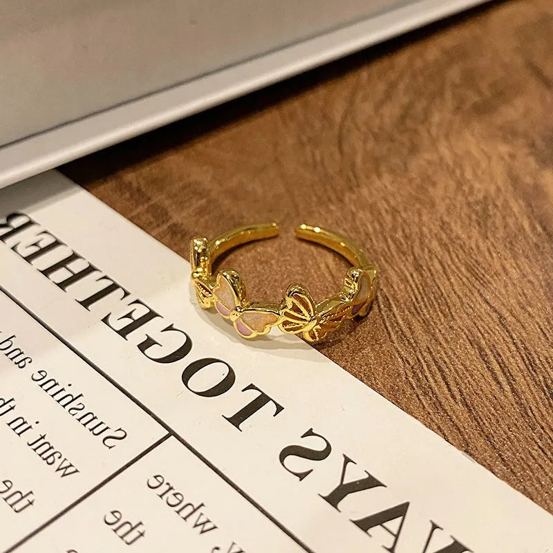 Creative Chinese butterfly women's copper ring with dripping oil treatment process in simple style.