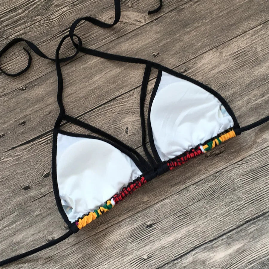 Women's black and white digitally printed split bikini with high-waist shorts and backless design