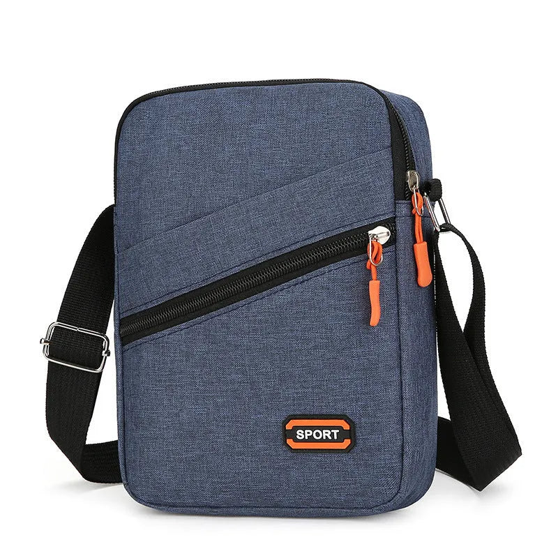 Simple solid-colour Oxford cloth crossbody commuter bag in silver grey, black, or navy blue.