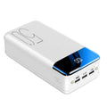 Black and white 50000mAh power bank with three USB output ports showing dimensions 169x83x52mm