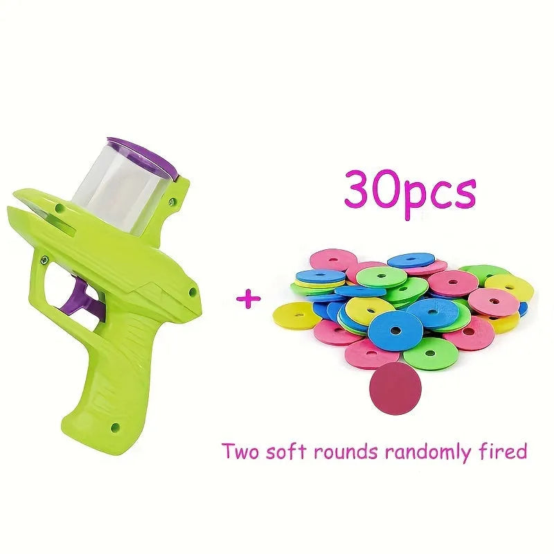 Interactive cat toy launcher with foam disc in green or purple colour