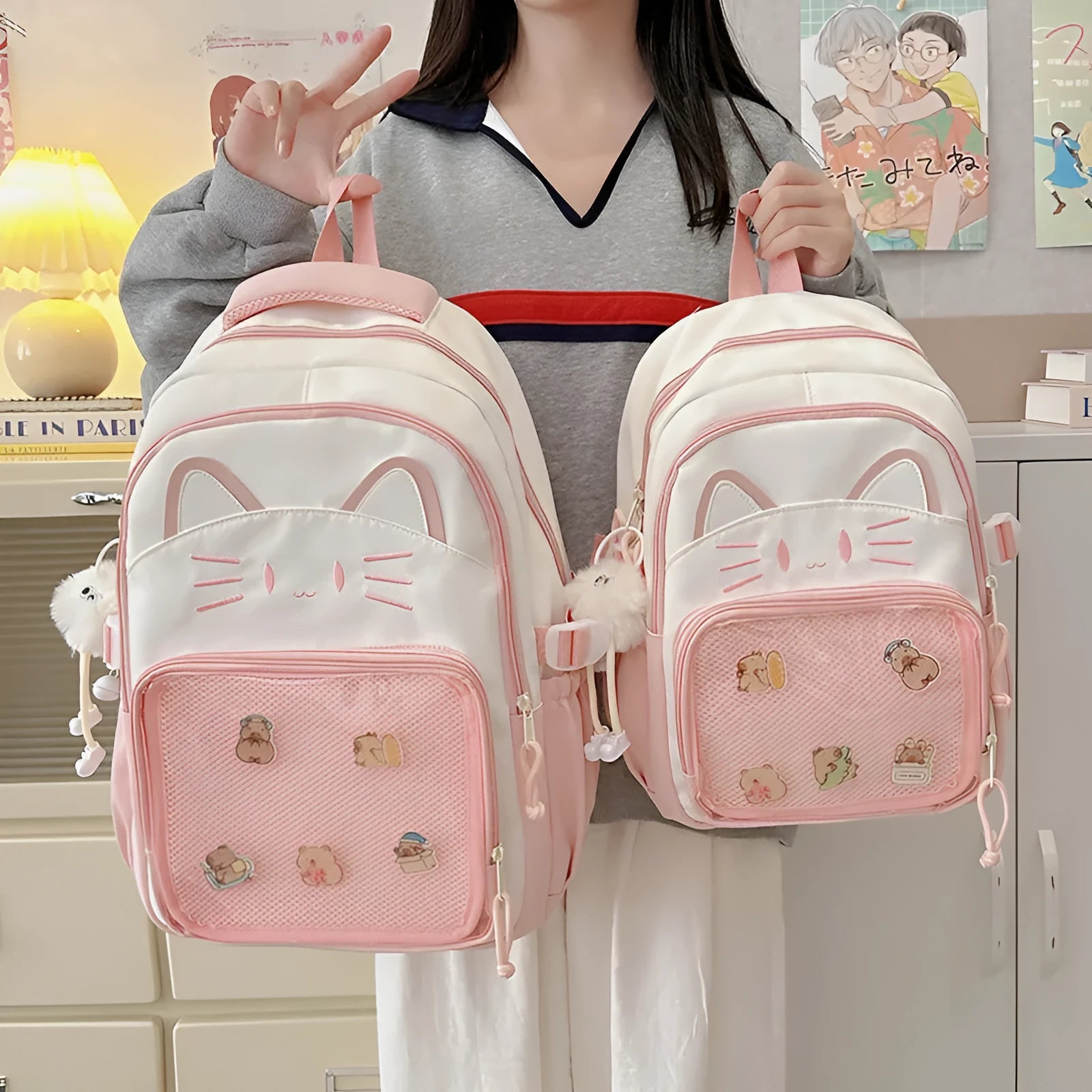Korean cartoon animation style backpack in two sizes with curved shoulder straps.