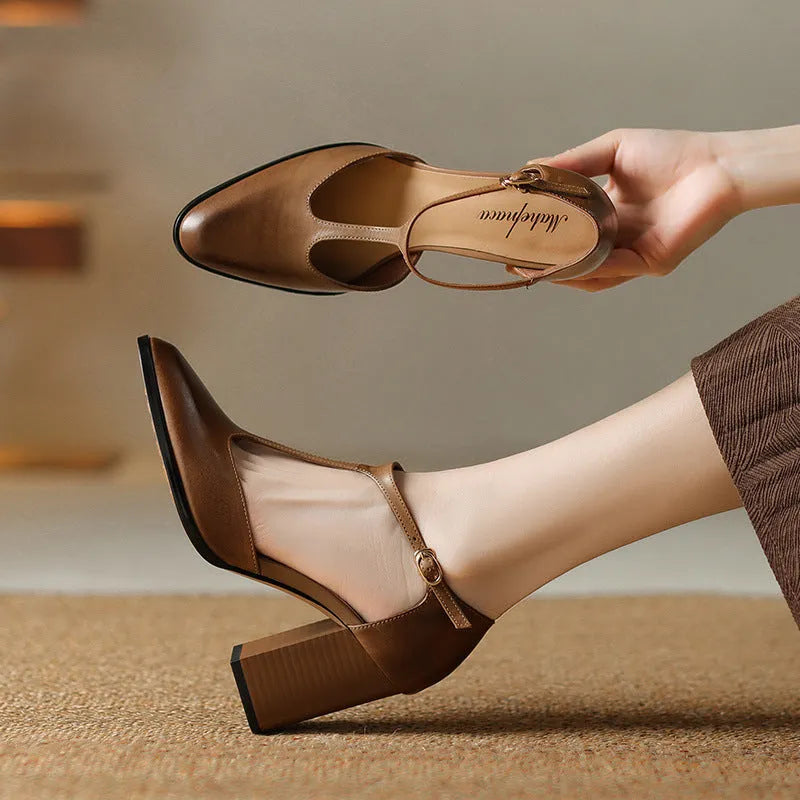 Women's dark brown retro pointed-toe Mary Jane shoes with a buckle fastening on the vamp.