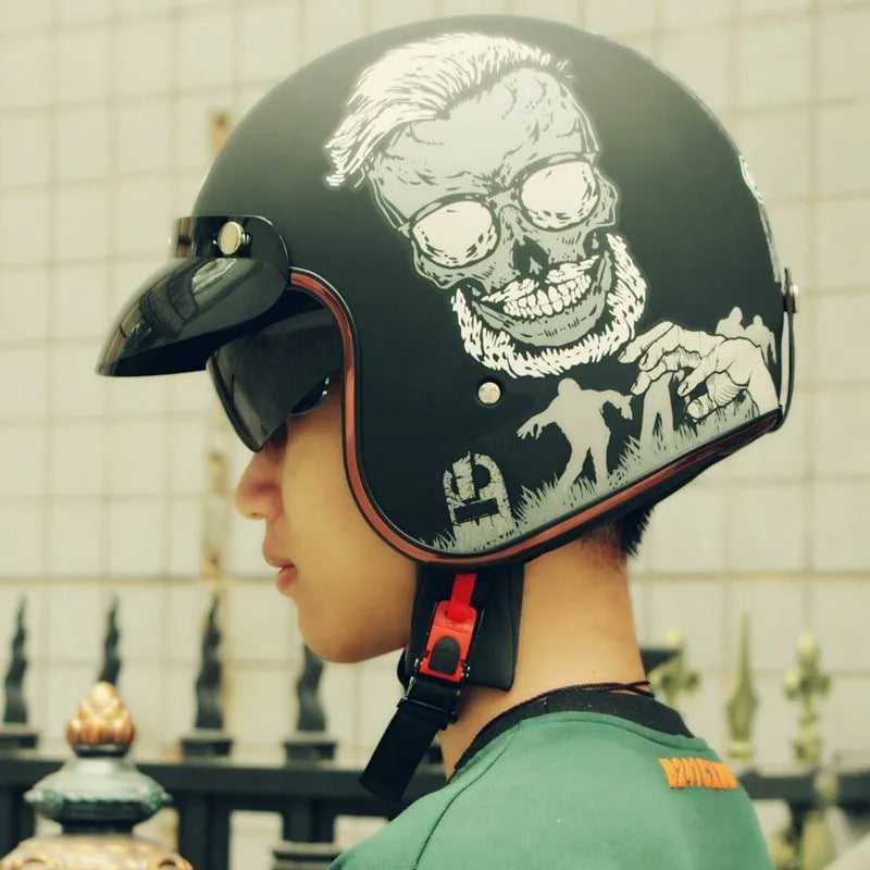 Retro electric bike half helmet in ABS plastic showing colour options including black, grey, orange and yellow designs