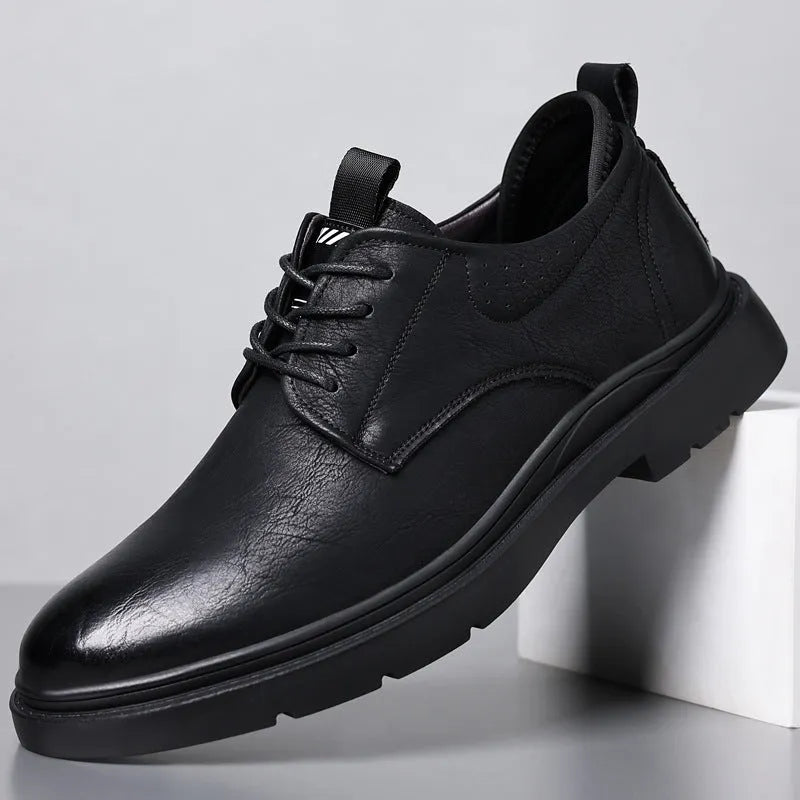 Men's black leather shoes with decorative sewing lines and rubber soles for business and wedding wear