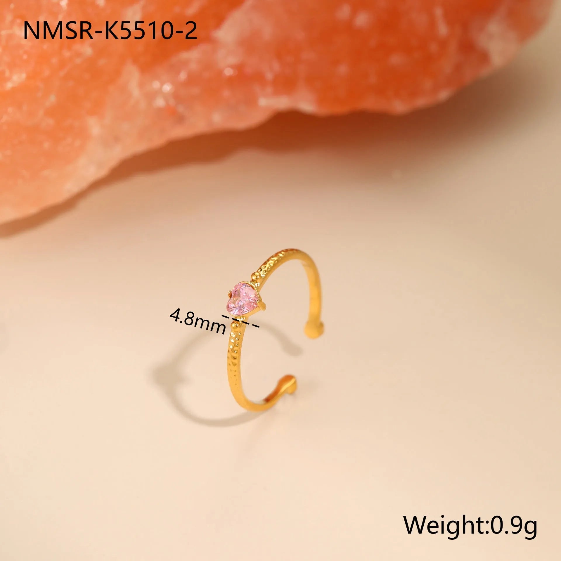Geometric open-ended ring with heart-shaped zircon inlay in stainless steel