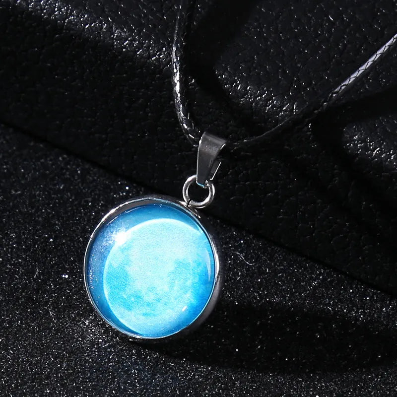 Alloy necklace with luminous glass pendant showing Christmas moon night sky and constellation design.