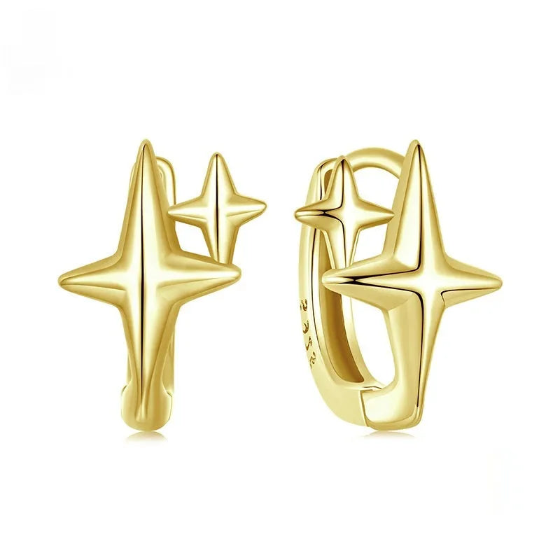 Minimalist star sterling silver ear clips with oxidised finish and XINGX element styling