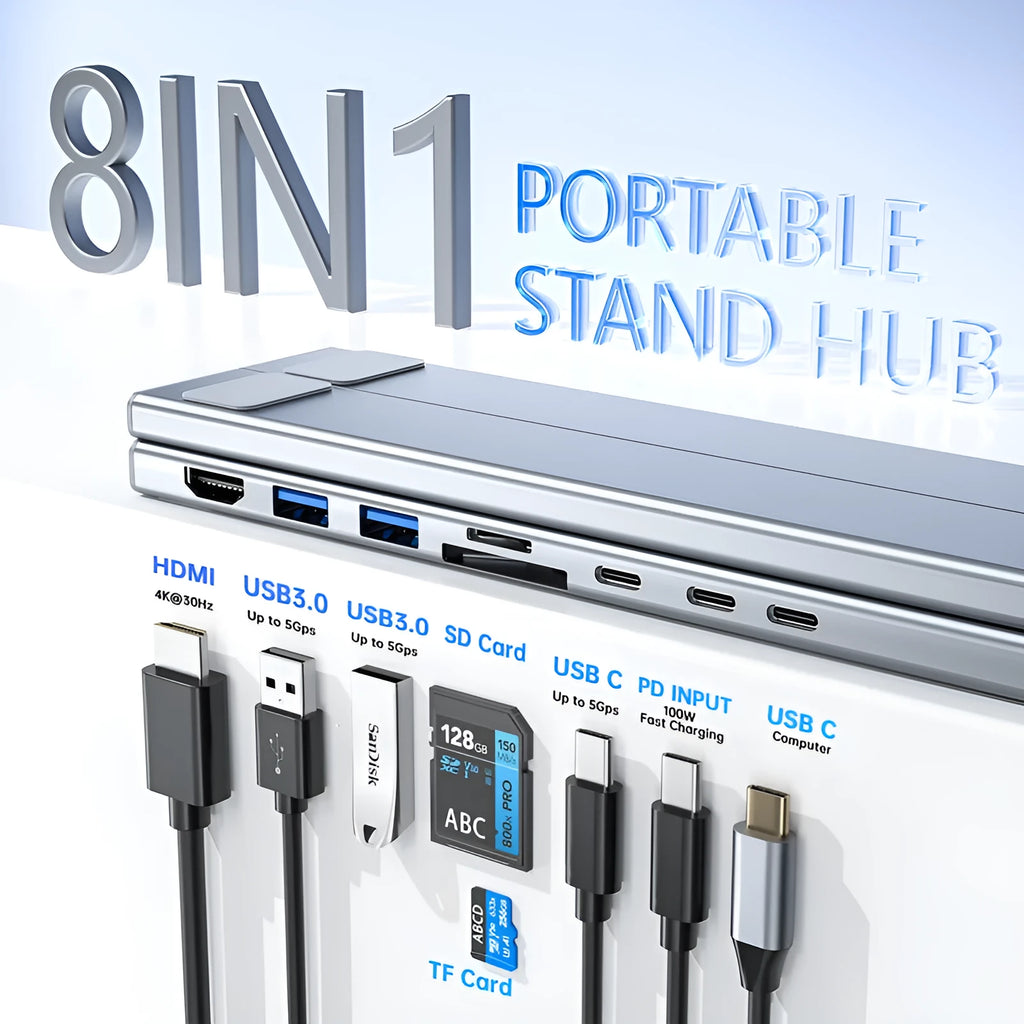 Silver aluminium alloy folding laptop stand with a built-in multi-port docking station hub.