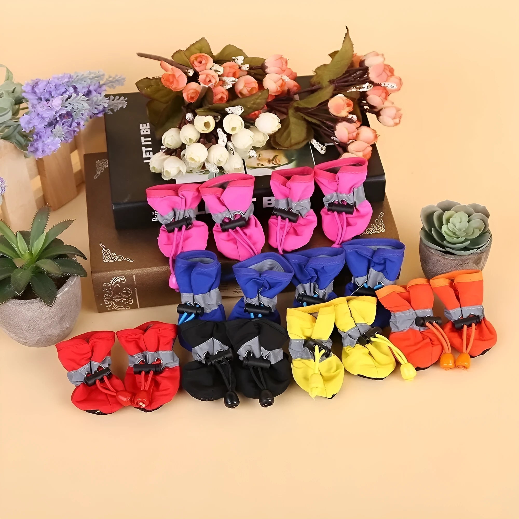 Soft sole cloth dog shoes showing multiple colour options including fleece-lined and monkey print designs