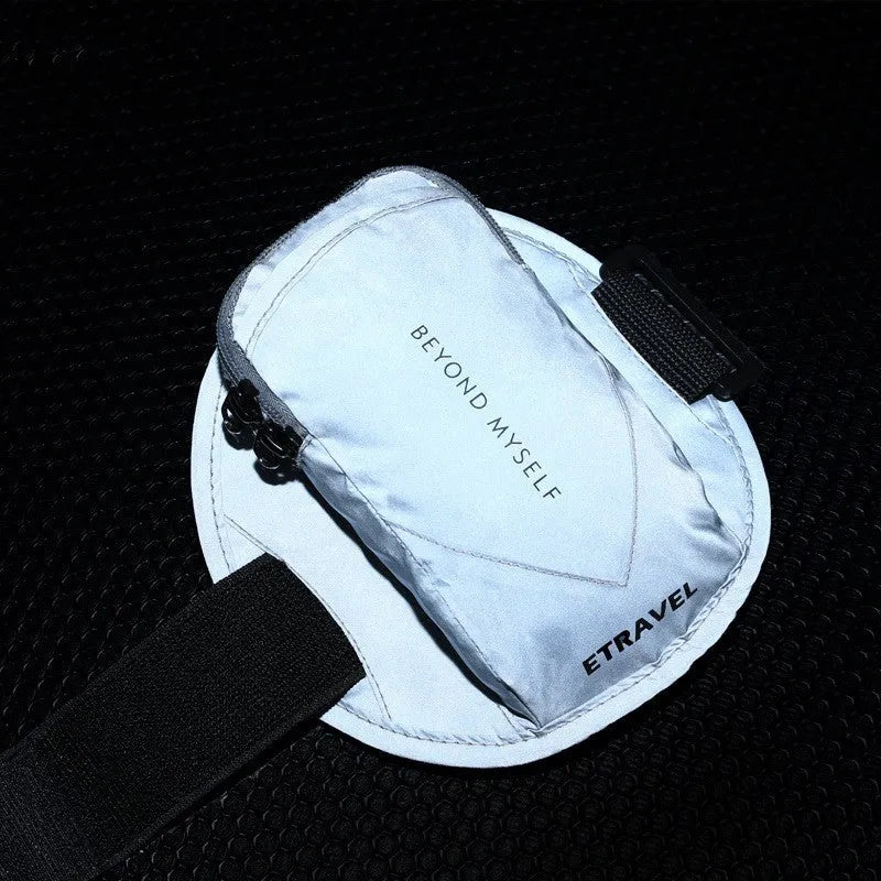 Reflective sports arm bag with strap, shown in fluorescent yellow, black, and silver grey colours.