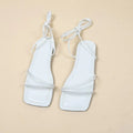 Women's ankle ring bandage cloth flat sandals with square toe in white, black, or orange red.