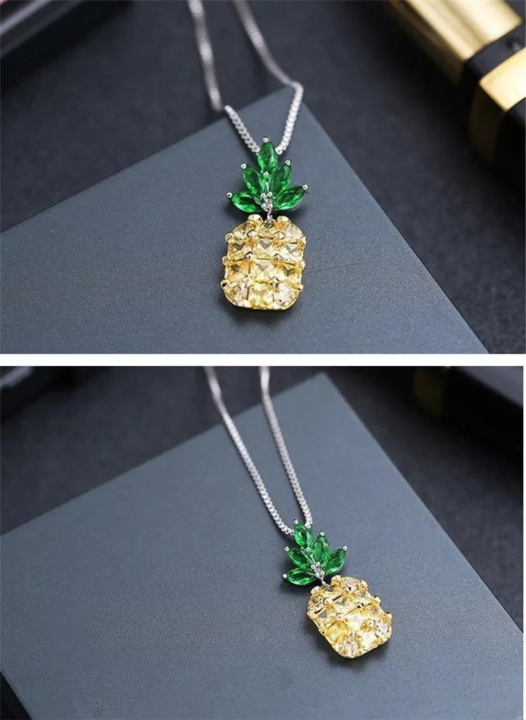 Silver geometric pineapple diamond pendant necklace on an adjustable chain.