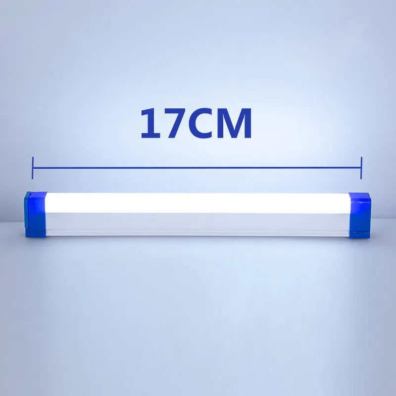 Rechargeable dimmable LED tube light in blue and purple colours shown in a bedroom setting.