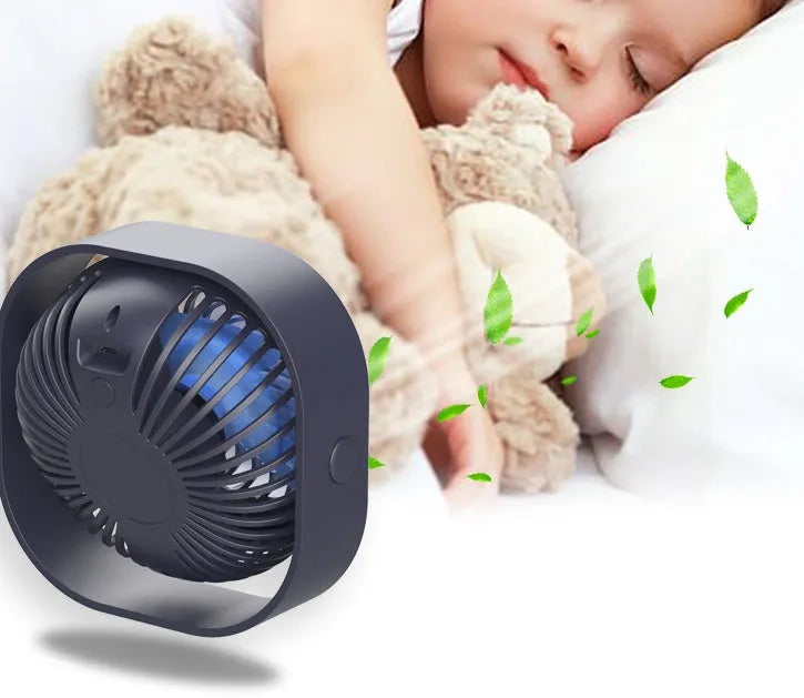 USB desk fan with alarm clock in modern simple style, showing 360-degree rotation feature.