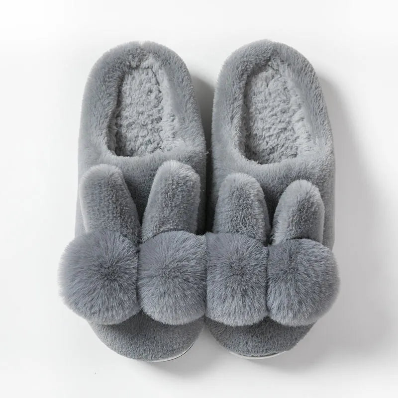 Women's rabbit fur winter slippers with high upper, floral pattern, and bunny-inspired fluffy design