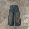 Men's black cotton denim shorts with flame embroidery patches and straight fit cut
