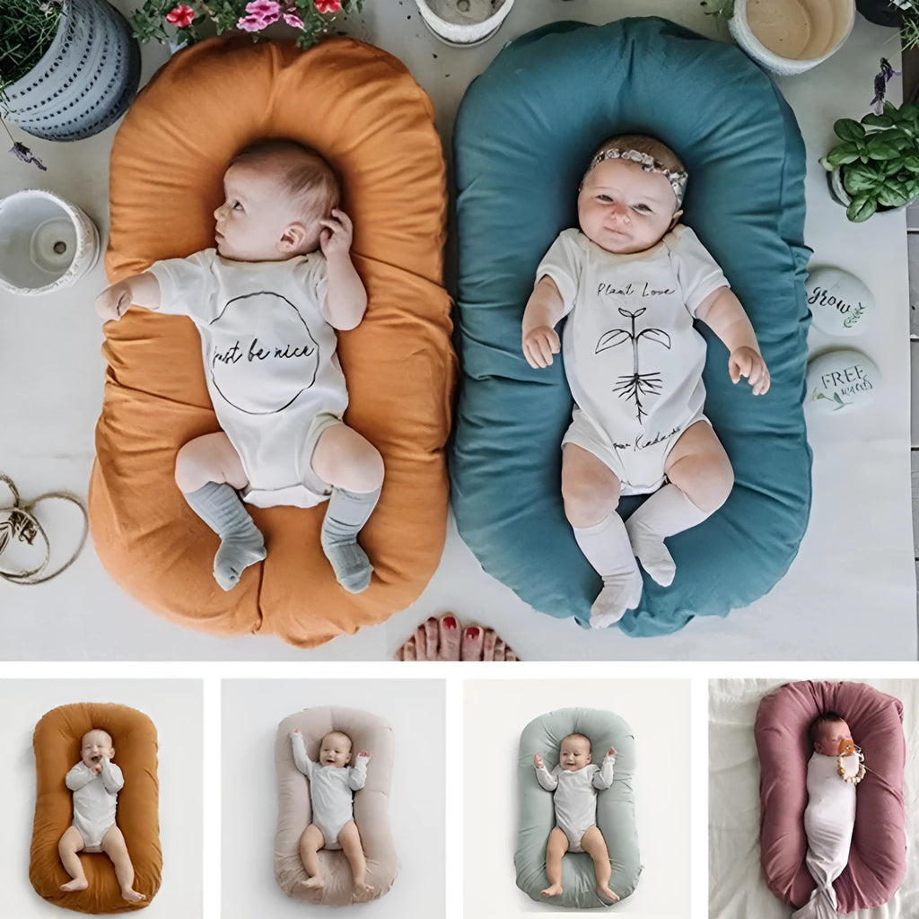 Beige portable cotton baby nest crib for newborn, measuring 75cm by 45cm.
