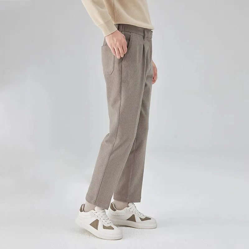 Men's straight-leg corduroy trousers in beige colour showing front view with mid-waist design