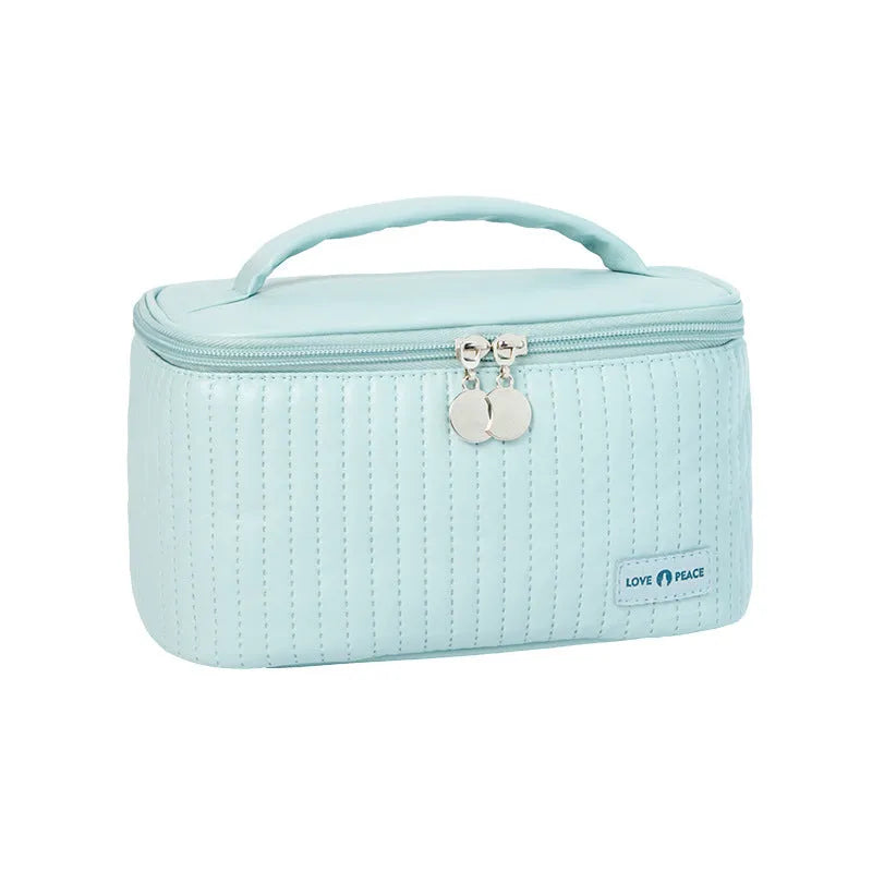 Open-top PU leather makeup bag in a choice of six solid colours: pink, coffee, beige, light blue, light green, light purple.