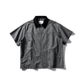 Short sleeve washed overalls shirt in a loose cardigan style, shown in khaki colour.