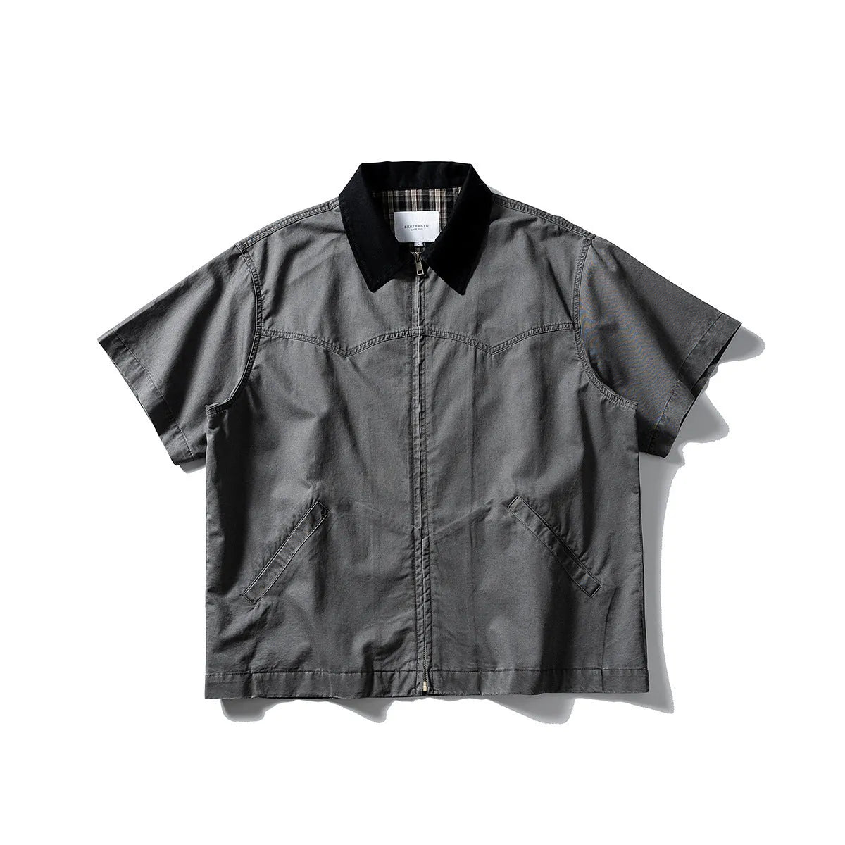 Short sleeve washed overalls shirt in a loose cardigan style, shown in khaki colour.