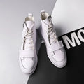 Men's black and white PU leather winter ankle boots in a high-top sneaker style.