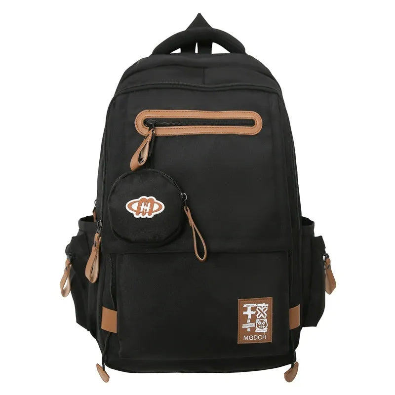 Large black nylon school backpack with curved shoulder straps for secondary school students.