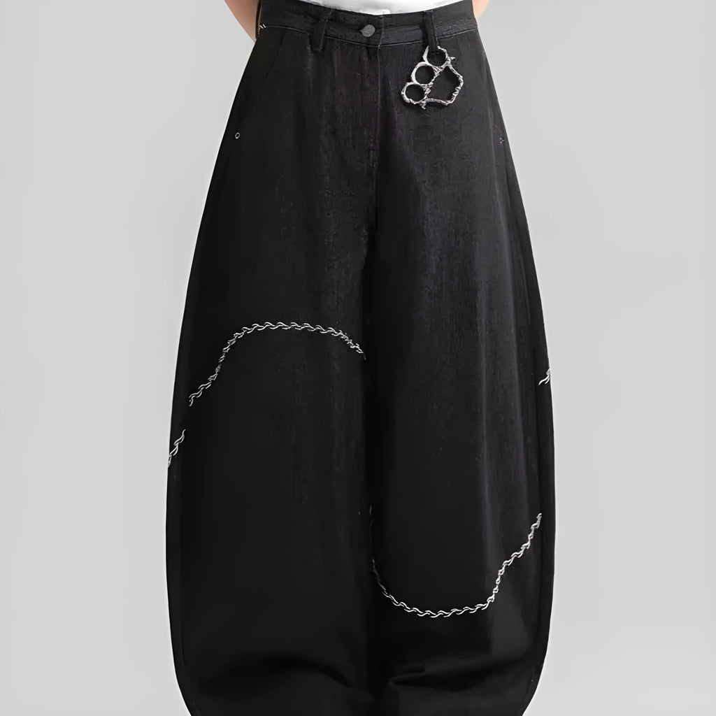 Men's black straight-leg jeans with a mid waist and zip fly, shown laid flat.