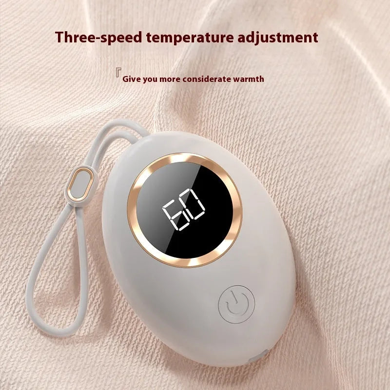 USB-powered hand warmer with digital display showing temperature, in charming blue colour