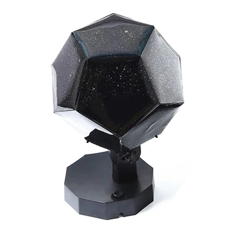 LED starry sky projector night lamp showing constellation projection on a bedroom ceiling.
