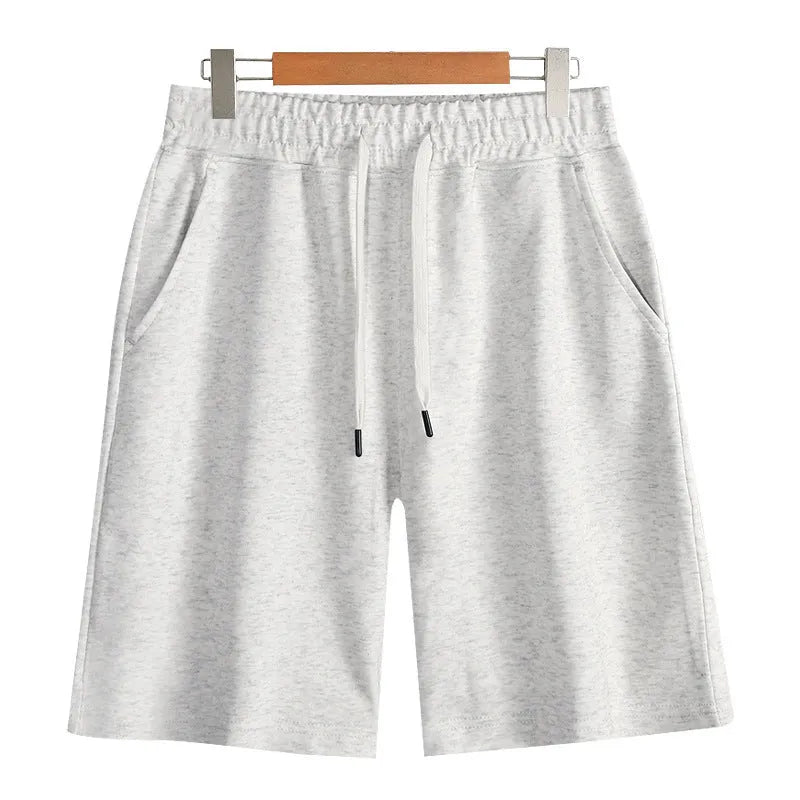 Straight leg cotton sports shorts in light grey on a neutral background.
