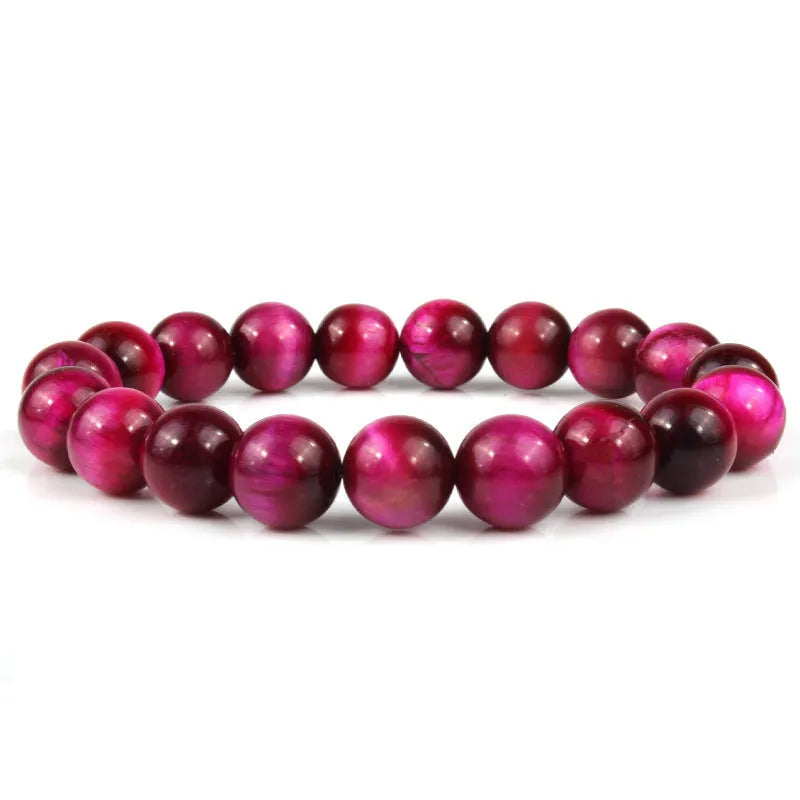 Natural tiger eye crystal beaded bracelet for men and women on a white background.