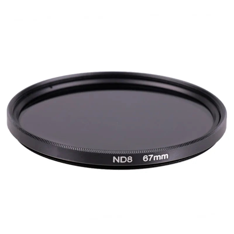 ND8 neutral density camera filter reducer with aviation aluminium frame shown next to lens.