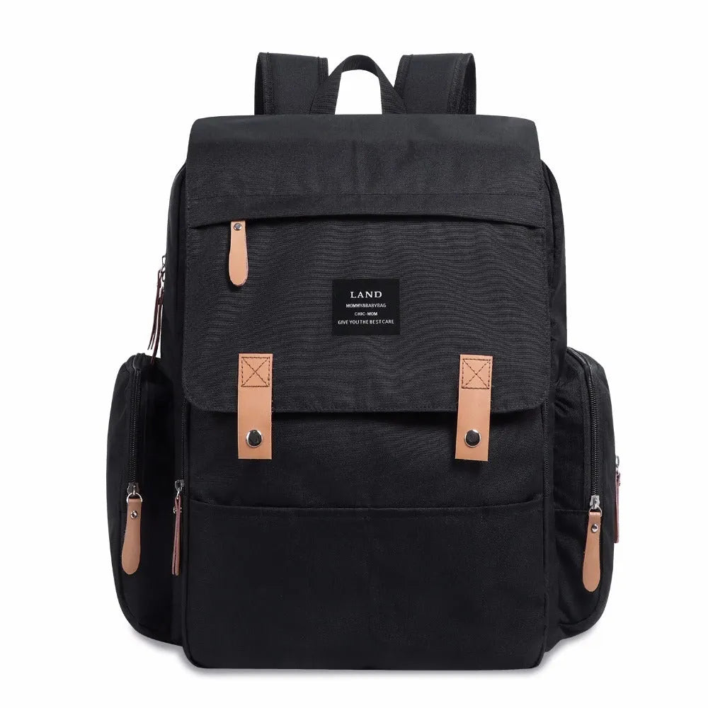 LAND Mommy large grey Oxford cloth diaper backpack with changing mat, showing front compartments.